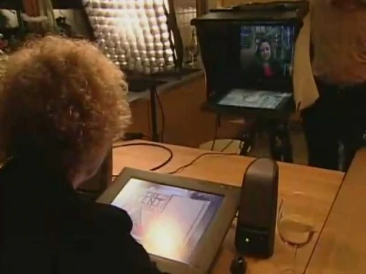 Atwood at home in her kitchen chats with the fan who is located hundreds of kilometres away. Image by Unotchit.