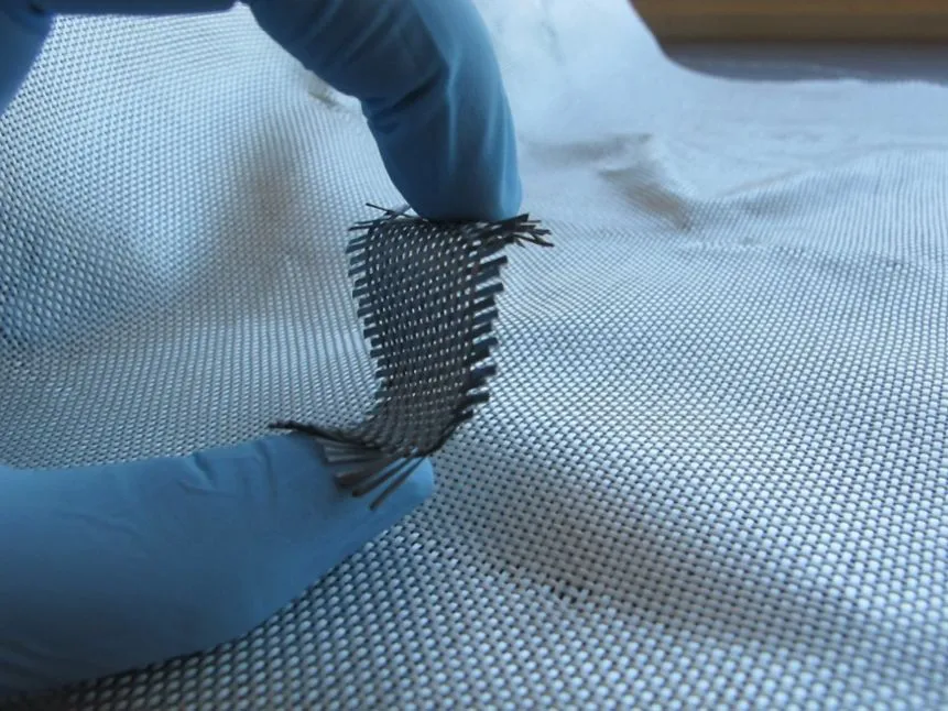 Scientists have applied conductive nanocoatings to textiles, which could pave the way for electronic devices made from fabric or paper (Image: Jesse Jur)