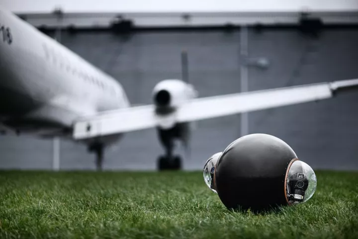 The Rotundus GroundBot spherically-shaped surveillance robot is equipped with a pair of cameras providing its remote operator with a live video feed in 3D