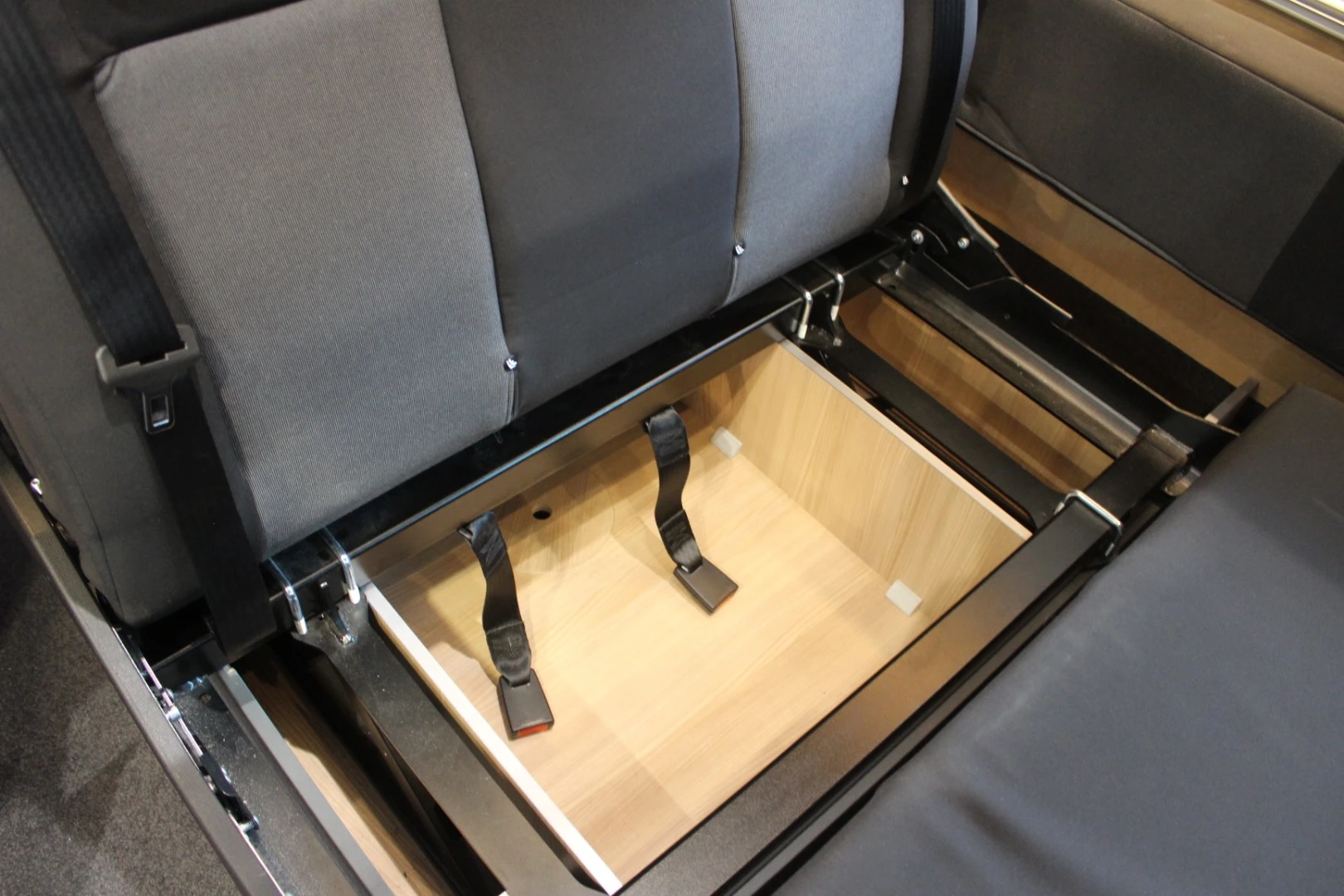 The bench includes hidden under-seat storage