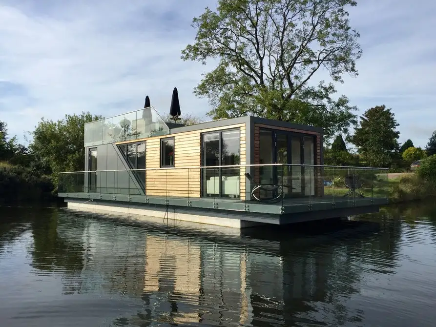 The entire roof of this Bluefield Houseboats home is available for use as terrace space and is accessed by a staircase on the exterior