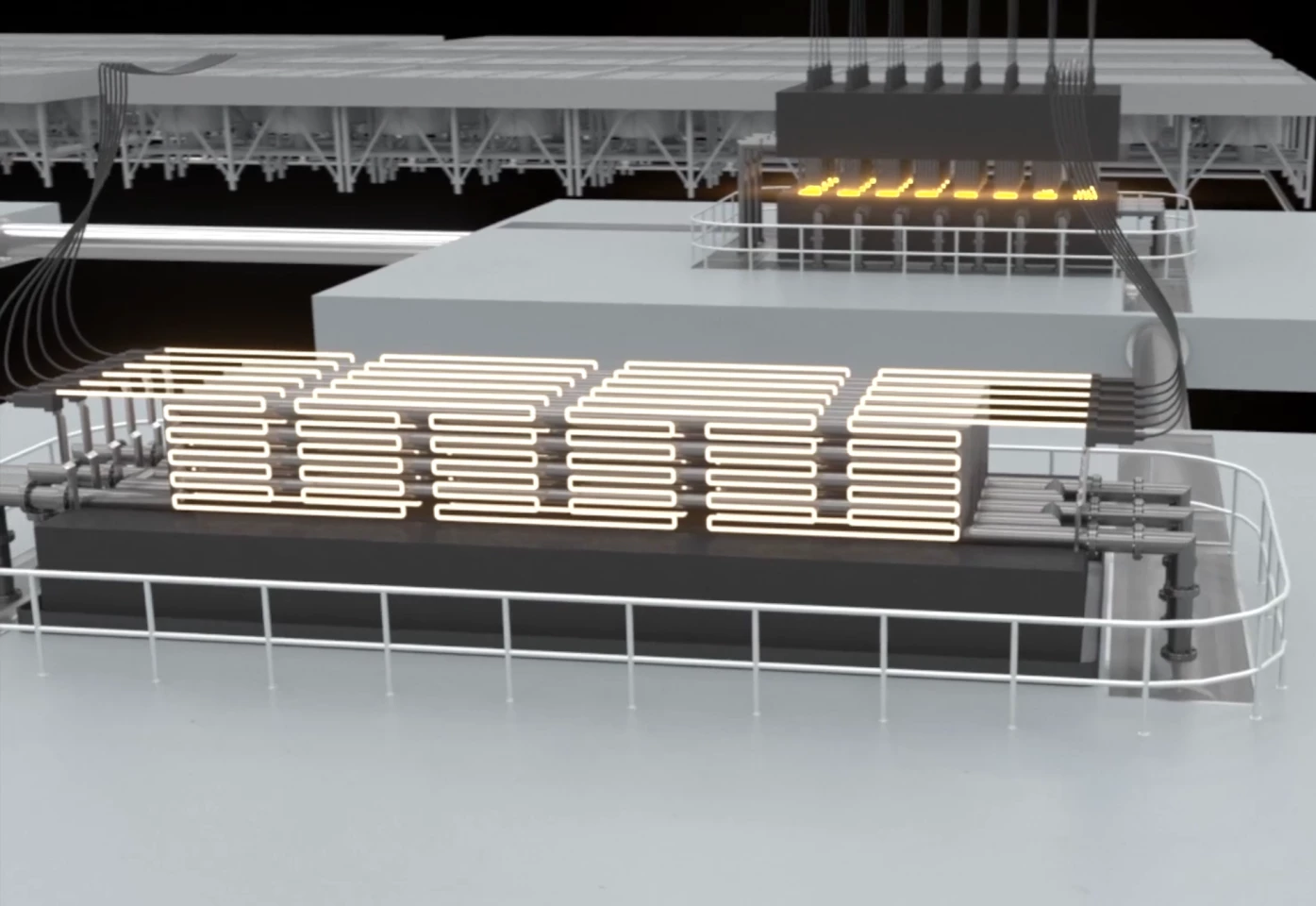 Heating elements load up liquid tin with energy, which is stored in white-hot graphite blocks