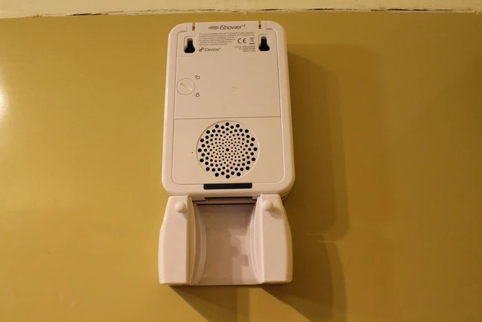 The speaker sitting atop its included shower mount