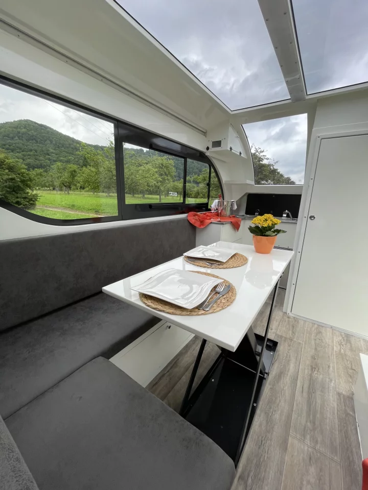The Raptor XC has a front kitchen and bathroom and a central living/dining lounge