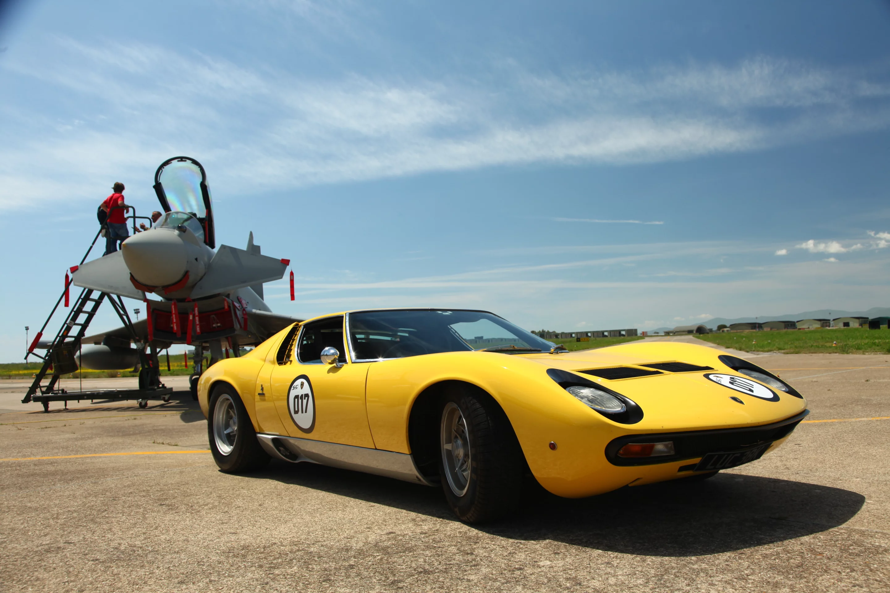 Miura challenging the airforce as part of the event's itinerary