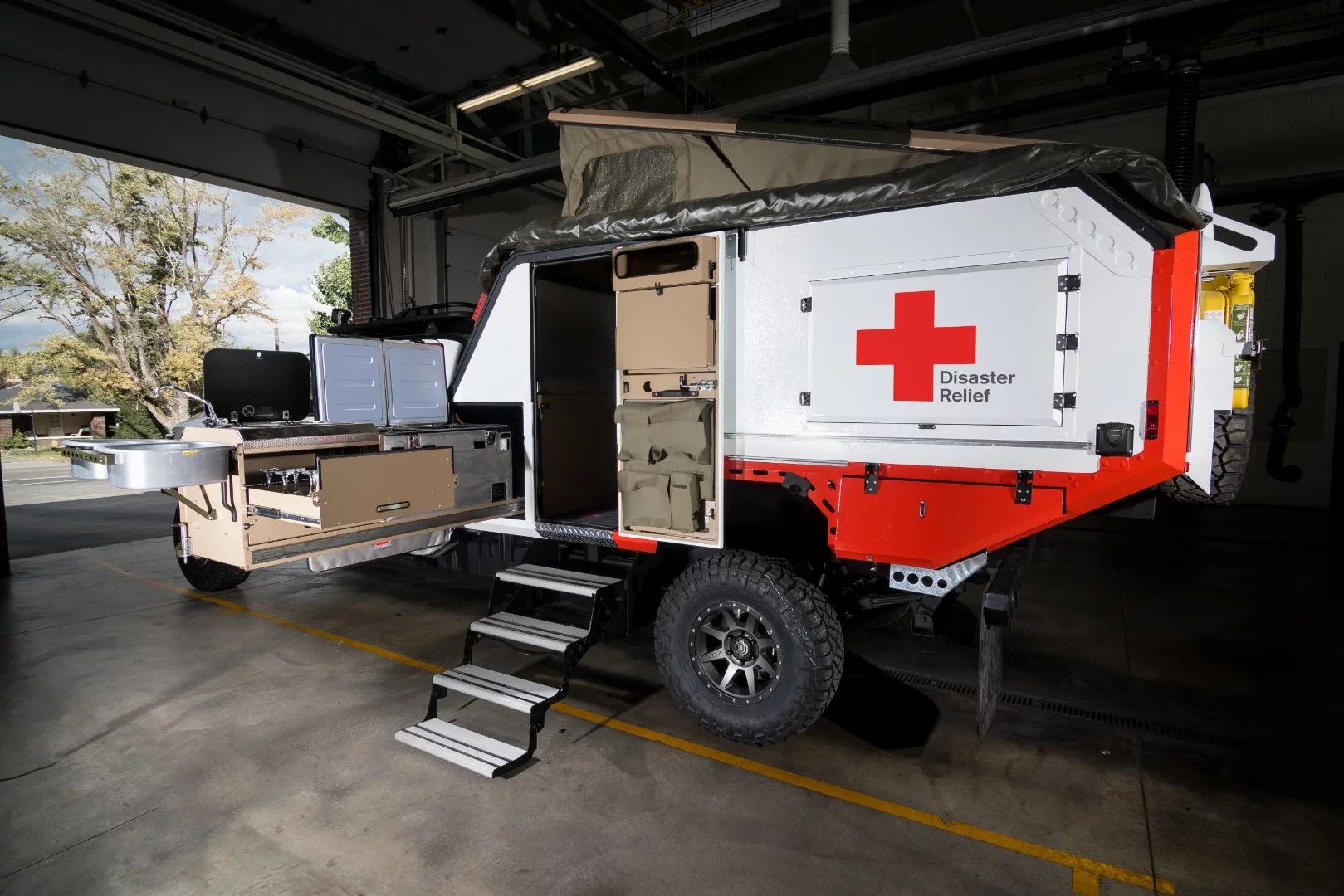 The slide-out kitchen and interior microwave allow responders to prepare meals for victims and transport blood in the fridge