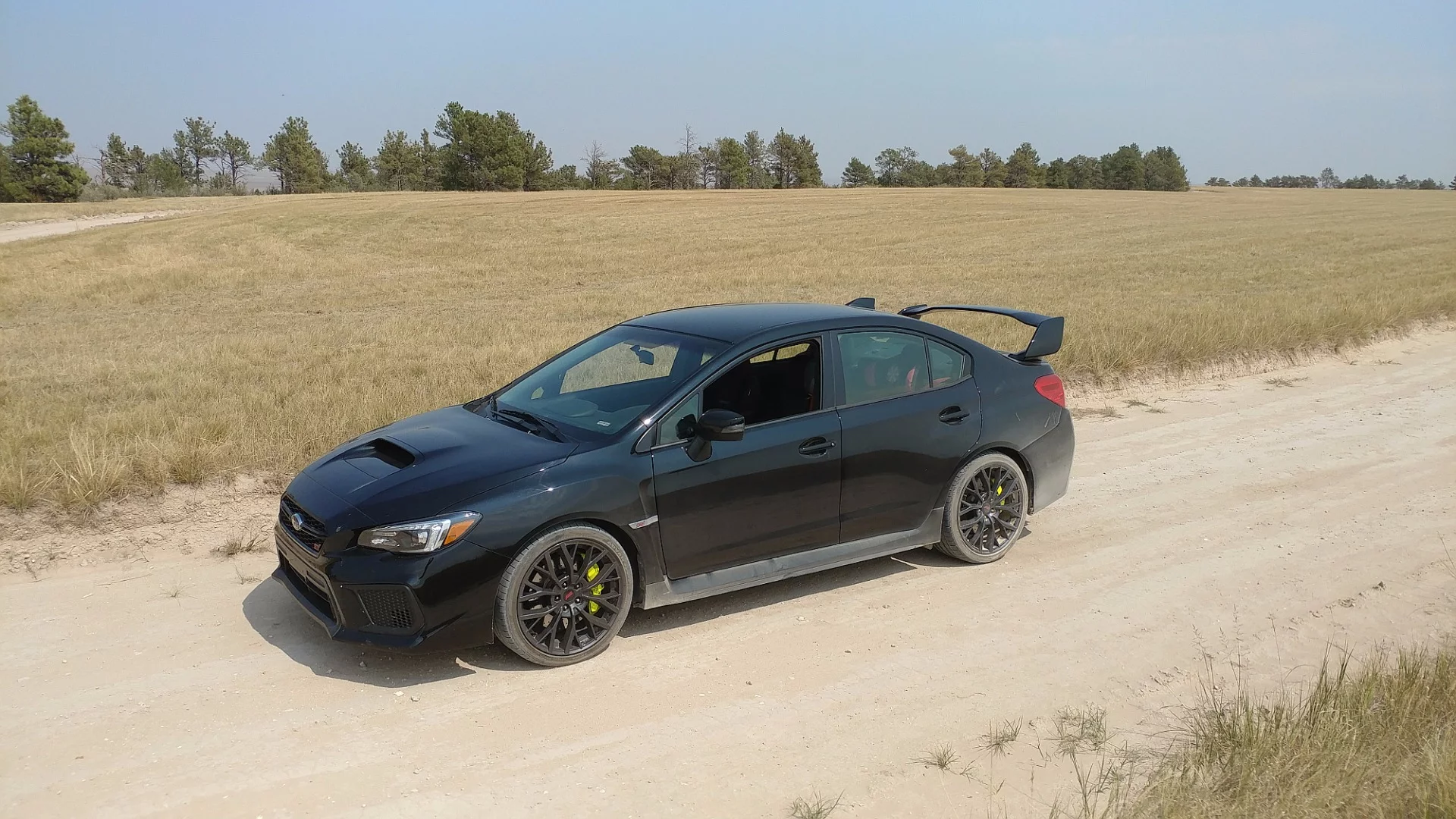 The 2018 Subaru STI is the performance-tuned model of the already performance-oriented WRX and is just a roll cage away from being ready for competitive rally racing