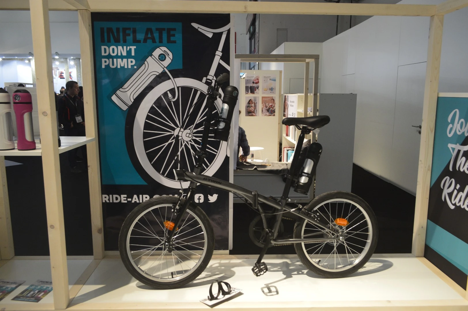A compact bike rigged up with RideAir pumps