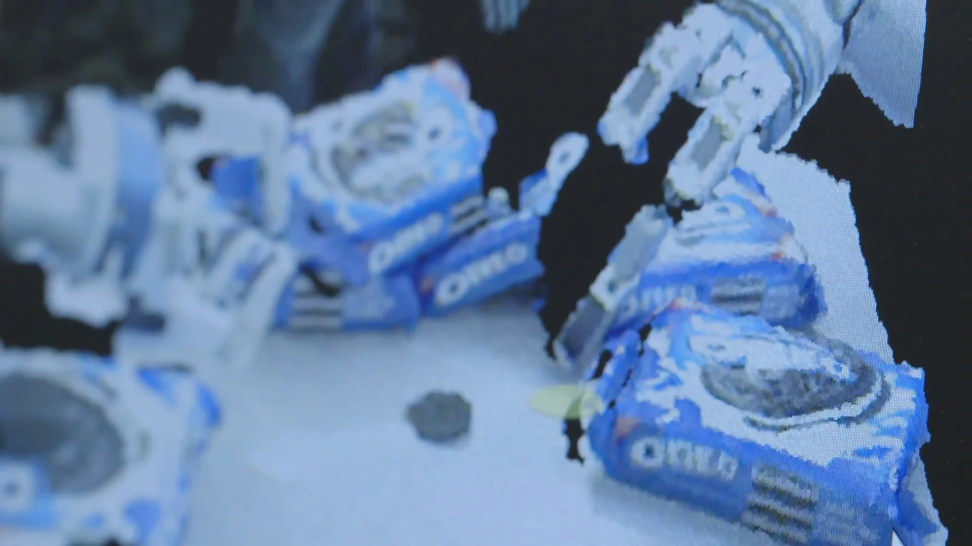 Point cloud data taken with depth sensing cameras gives HERB a detailed three-dimensional view of the table in front of it