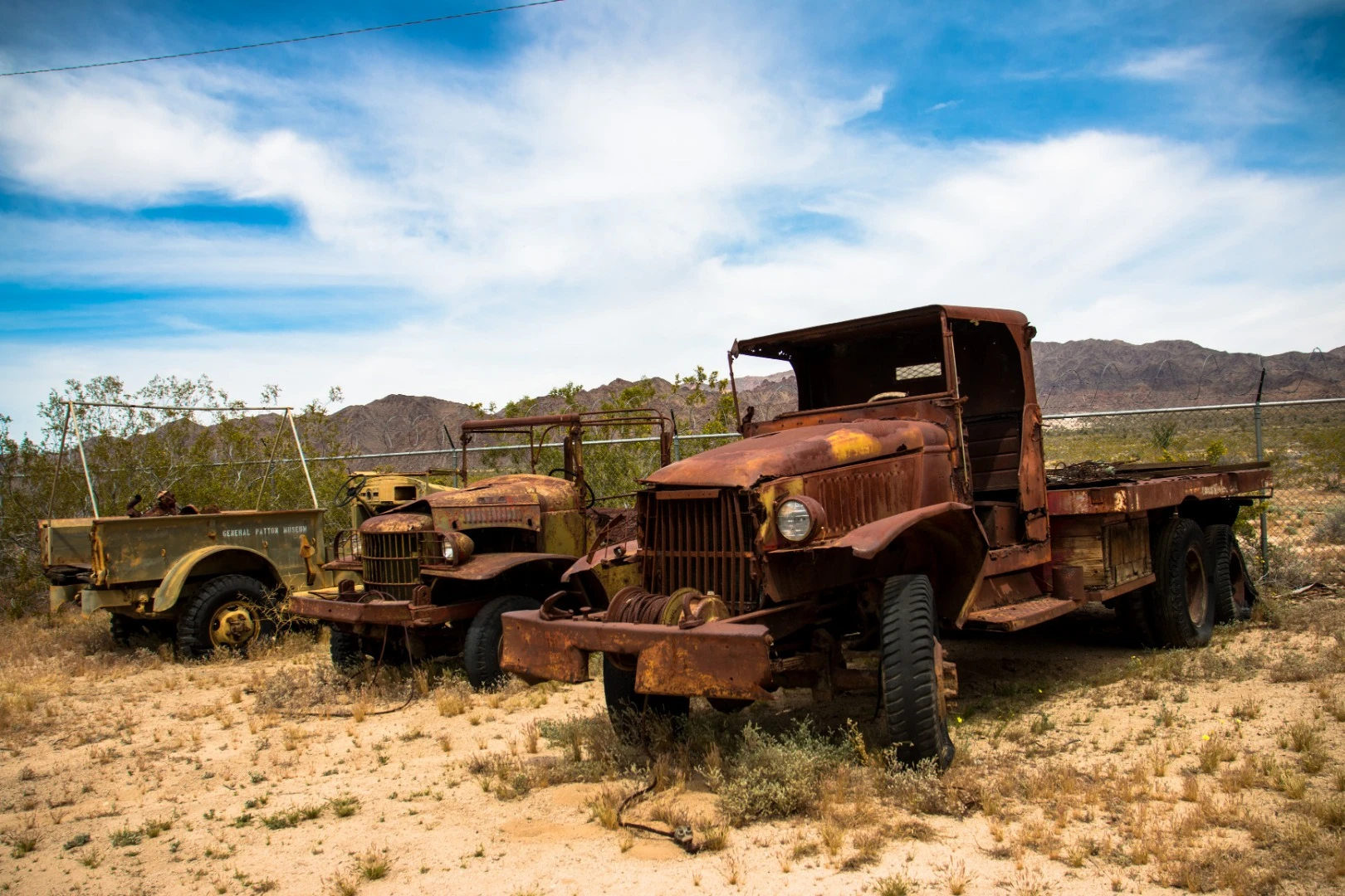 The GMC CCWK 6x6 truck, also known as the "Jimmy" (pictured on the right), is a 2.5-ton-capable off-road vehicle typically used for cargo transport. It saw duty in World War II as well as the Korean war before finally meeting its demise in the Mojave Desert in Southern California.The Dodge WC series (pictured middle), is likely a 1941-1942. They were the basic work horses for World War II