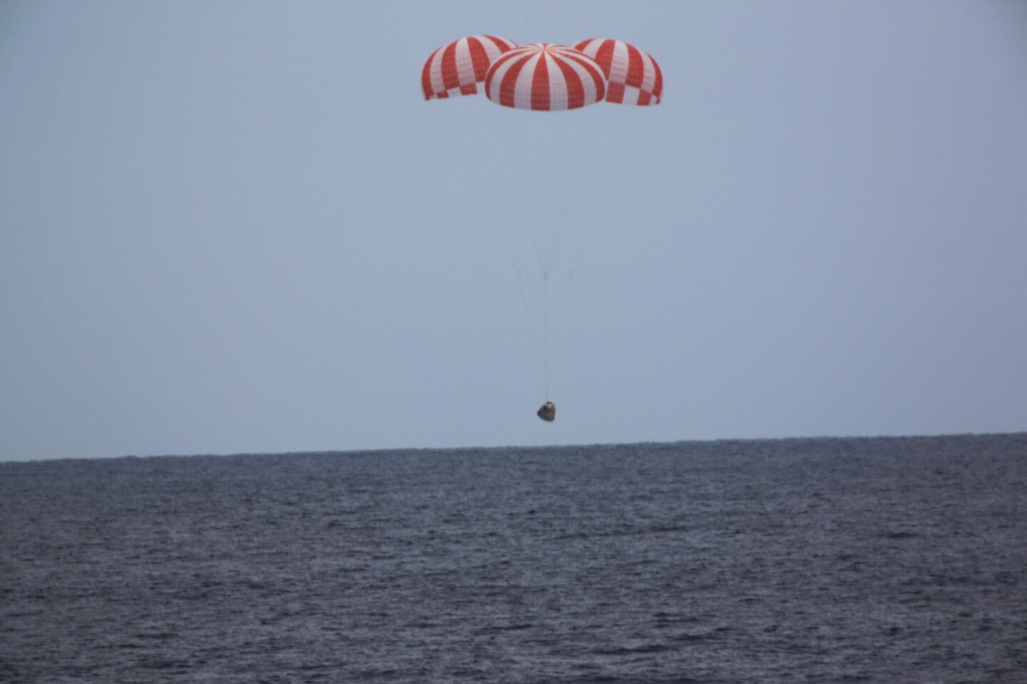 The Dragon spacecraft splashes down in the Pacific ocean