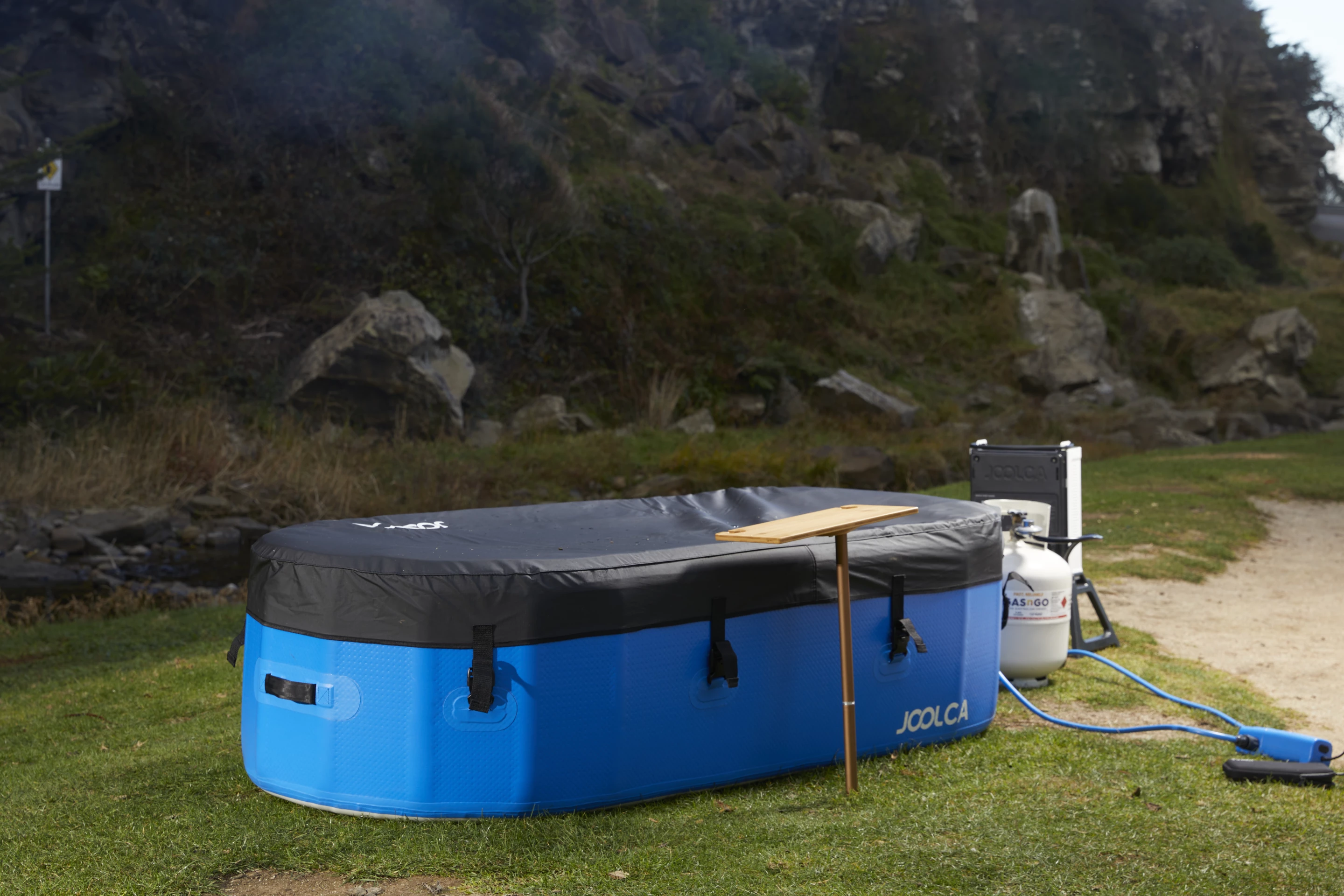 The Joolca Hottub comes with a cover that clips down to help keep the water warm and children safe