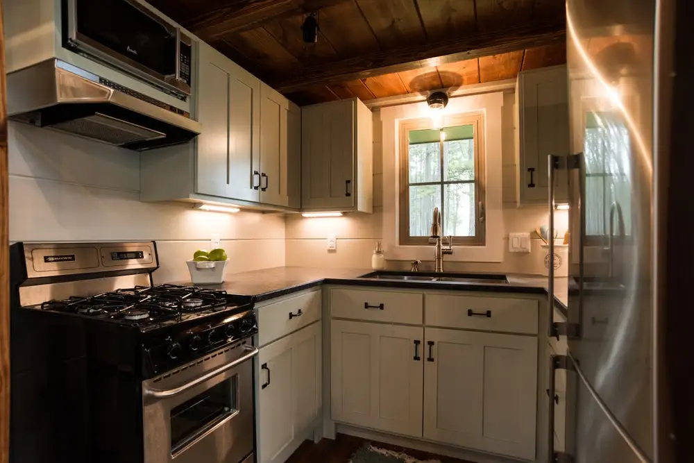 The Retreat's kitchen boasts granite countertops