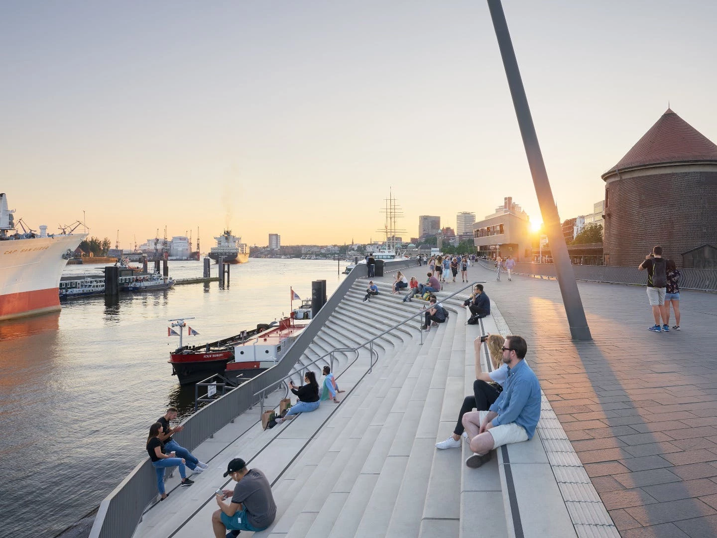 The Niederhafen River Promenade project allows pedestrians to gaze upon passing shipping