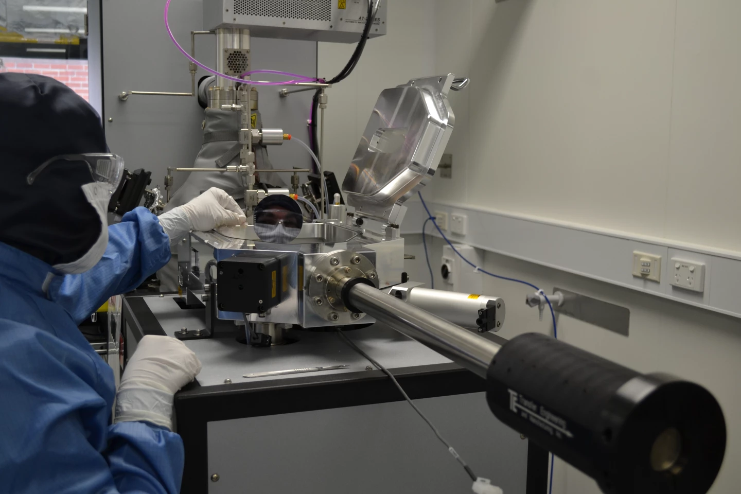 Lachlan Hyde works with one of two ALD systems at Australia’s Melbourne Centre for Nanofabrication (Photo: MCN)