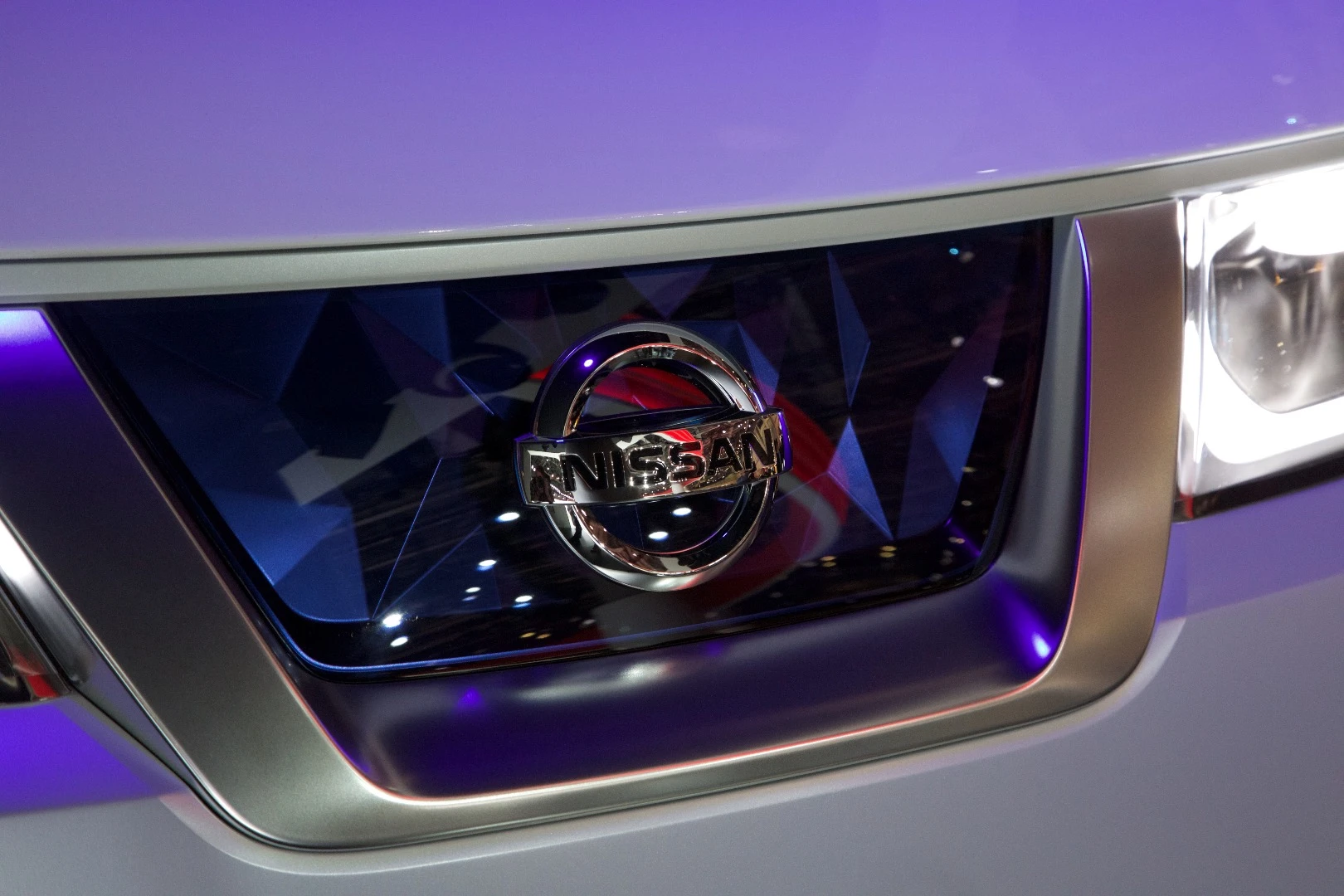 The Teatro wears Nissan's V motion grille and headlights