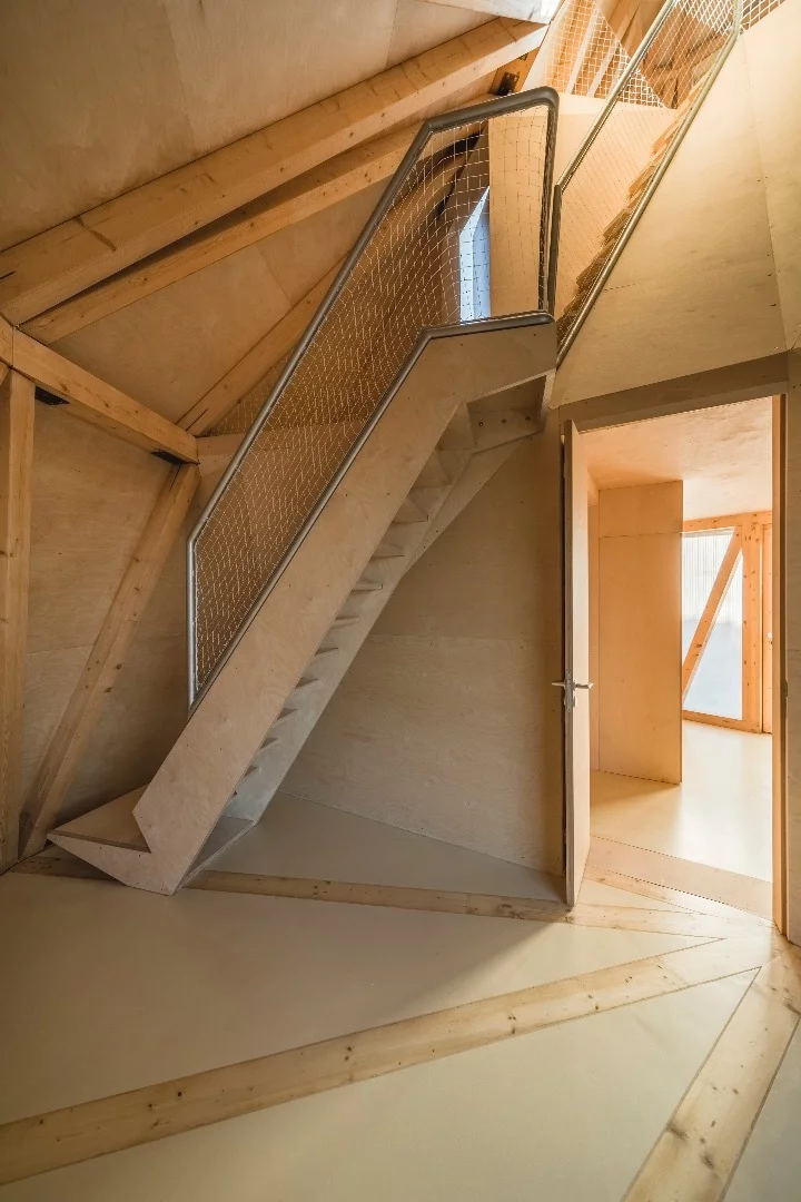 Stairs lead up to the House in the Orchard's bedroom and ensuite