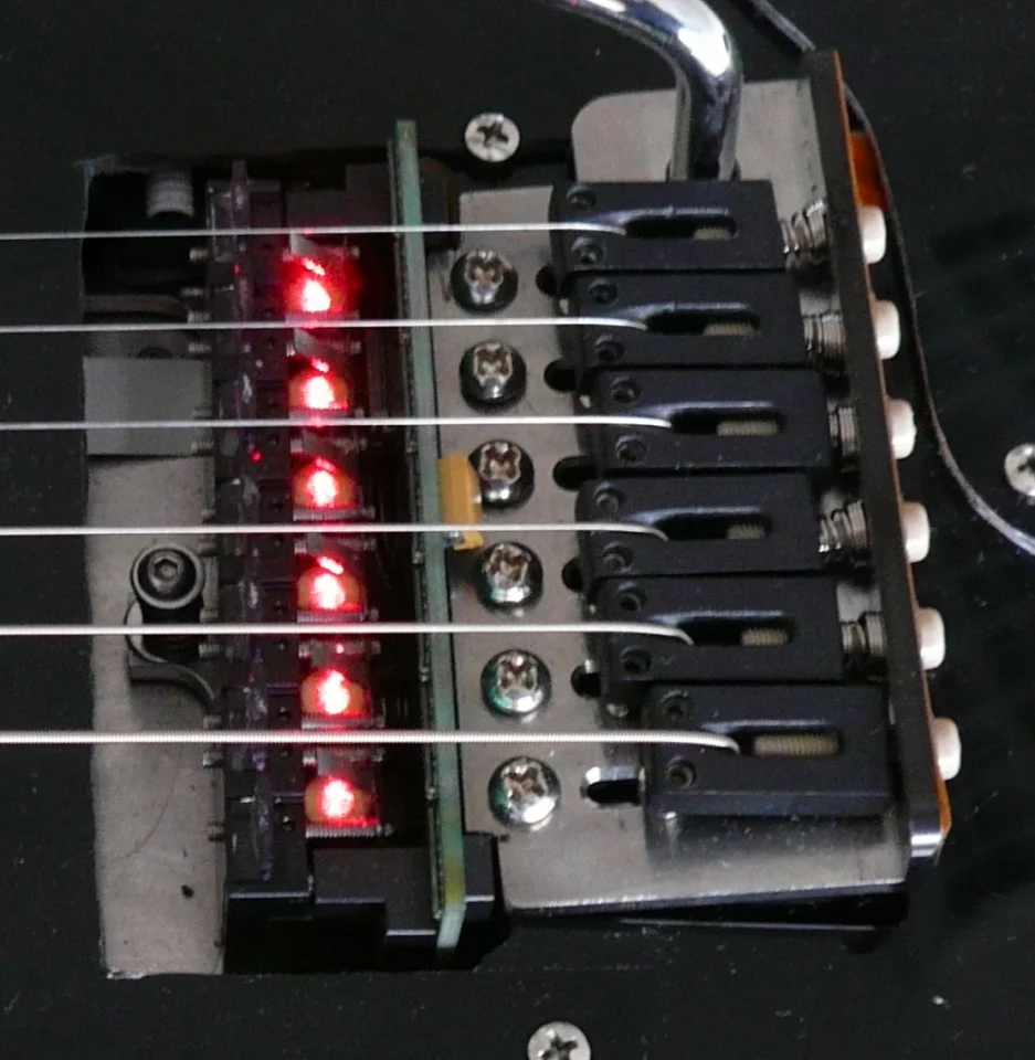 The LPD Pickup system also includes pressure-sensitive, piezo-elements built into the tailpiece to register such things as string bends