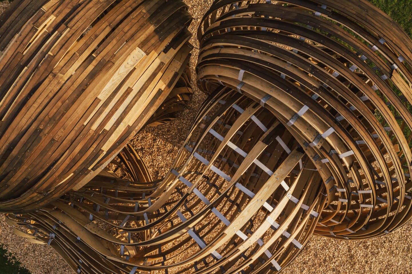 Steampunk comprises steam-bent pieces of hardwood that are connected with stainless steel brackets