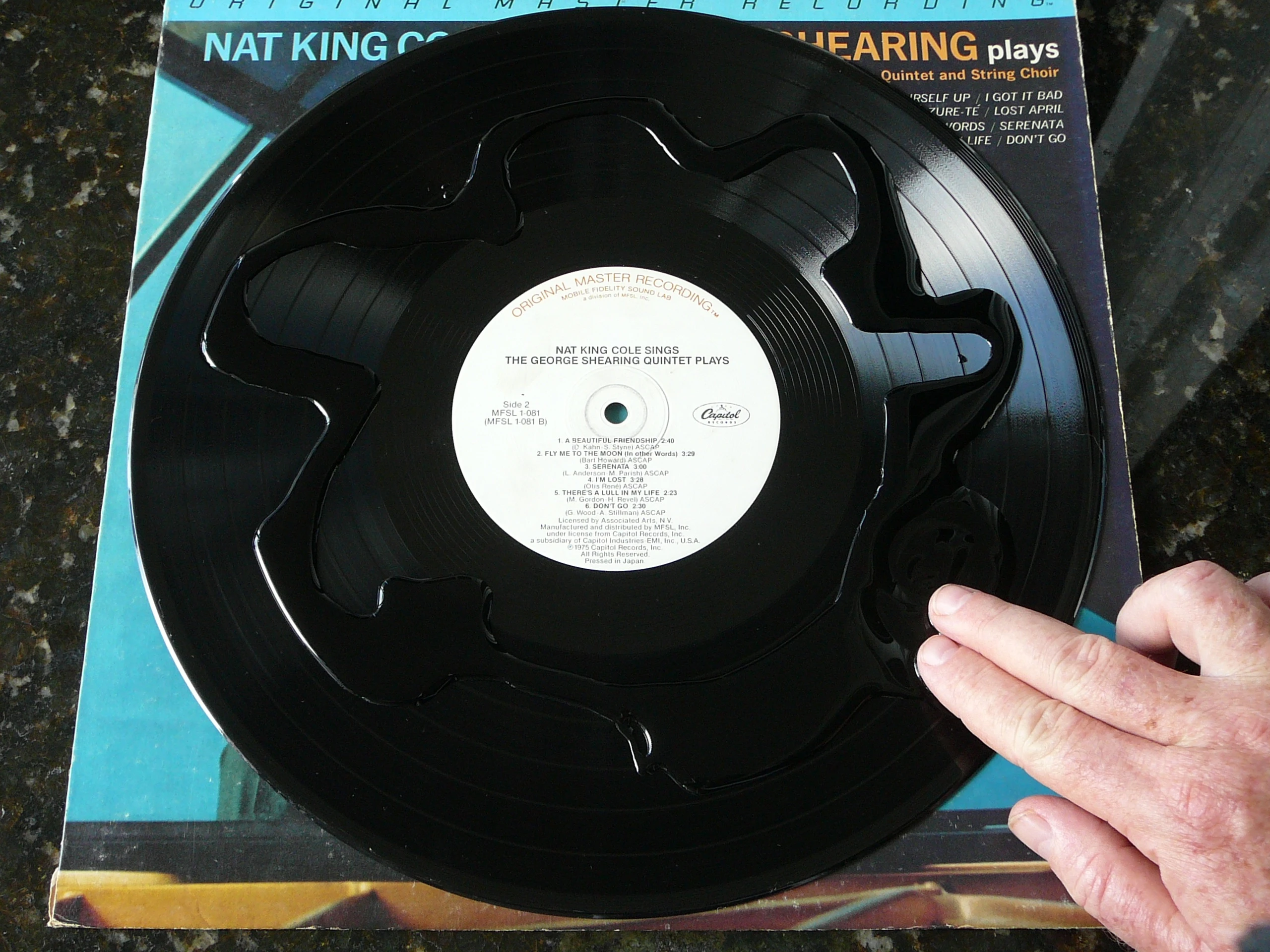 Spreading Record Revirginizer onto an LP