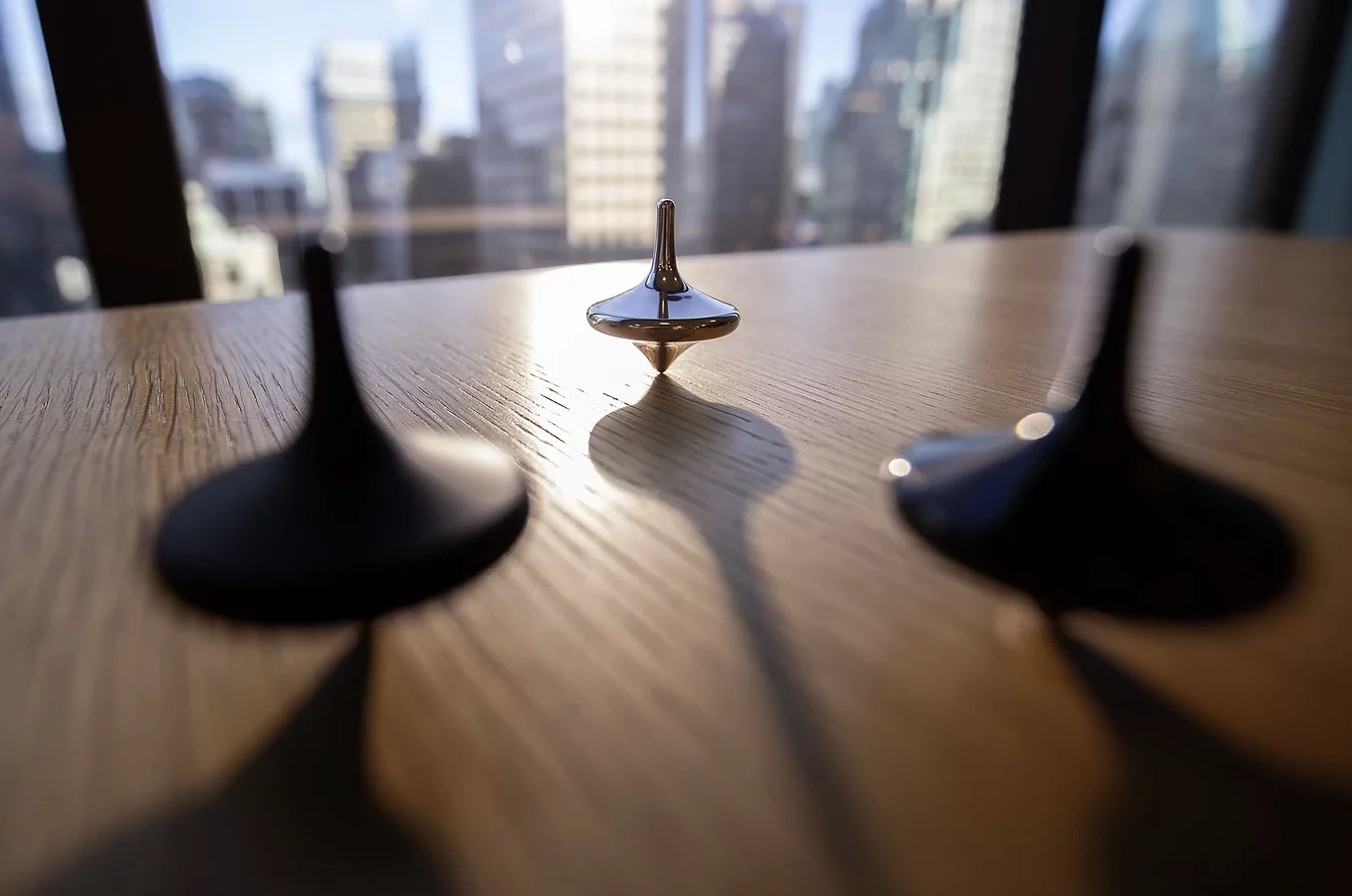 Limbo is actually a self-balancing gyro that keeps on spinning long after regular tops topple