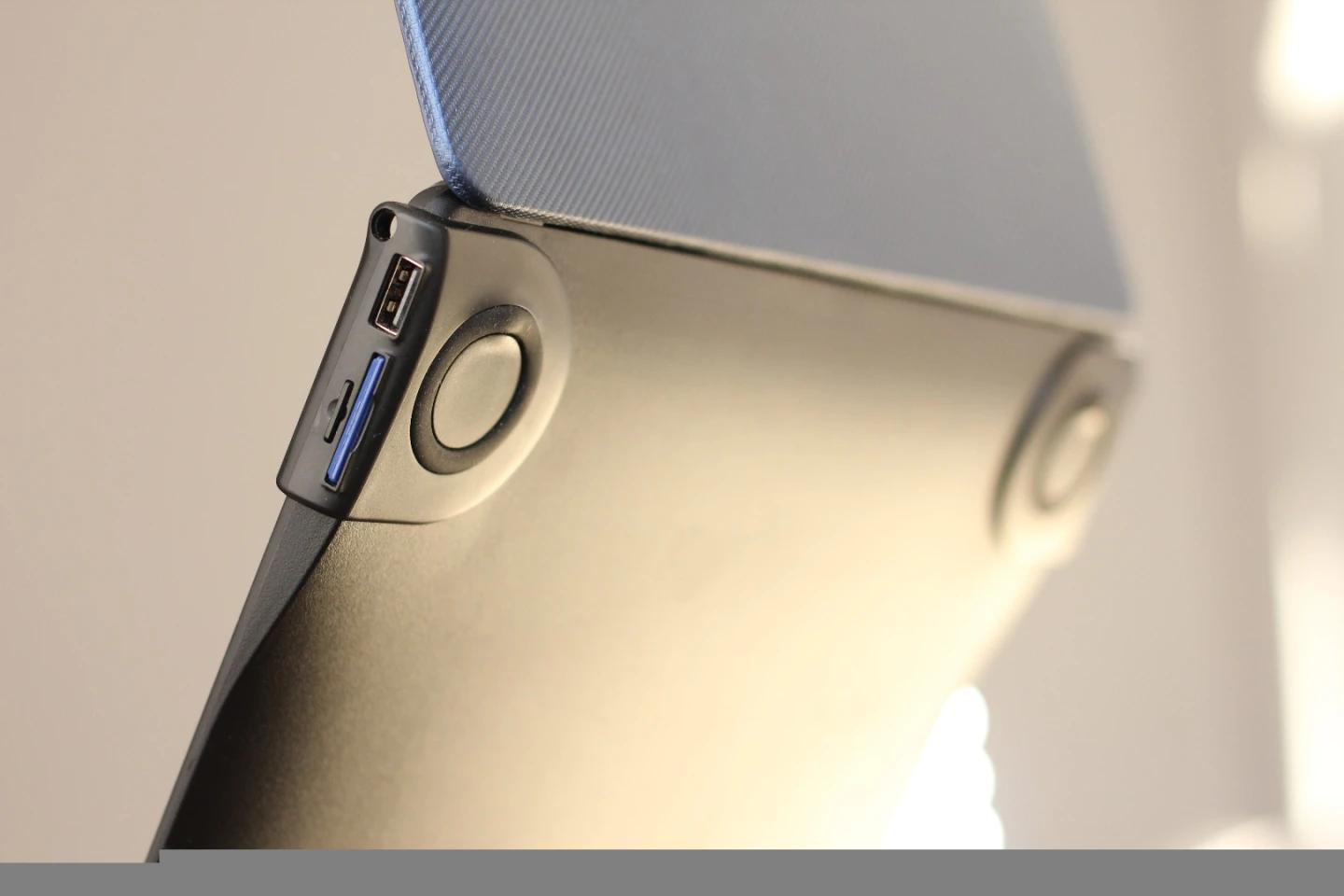 The case's right side, with headphone jack, USB-A, SD and SIM card slots