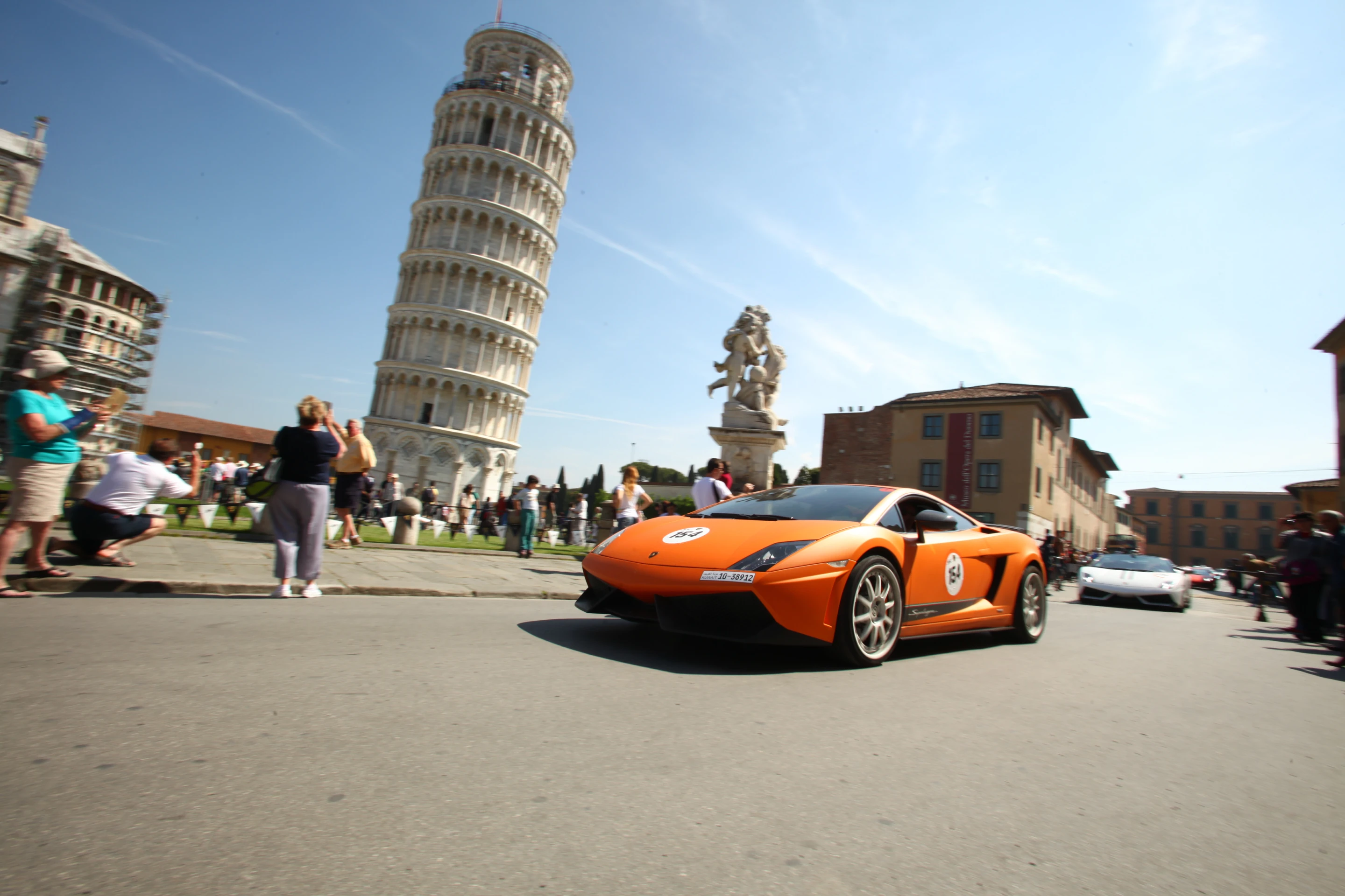 Gallardo participates in the anniversary tour with Leaning Tower of Pisa in the background