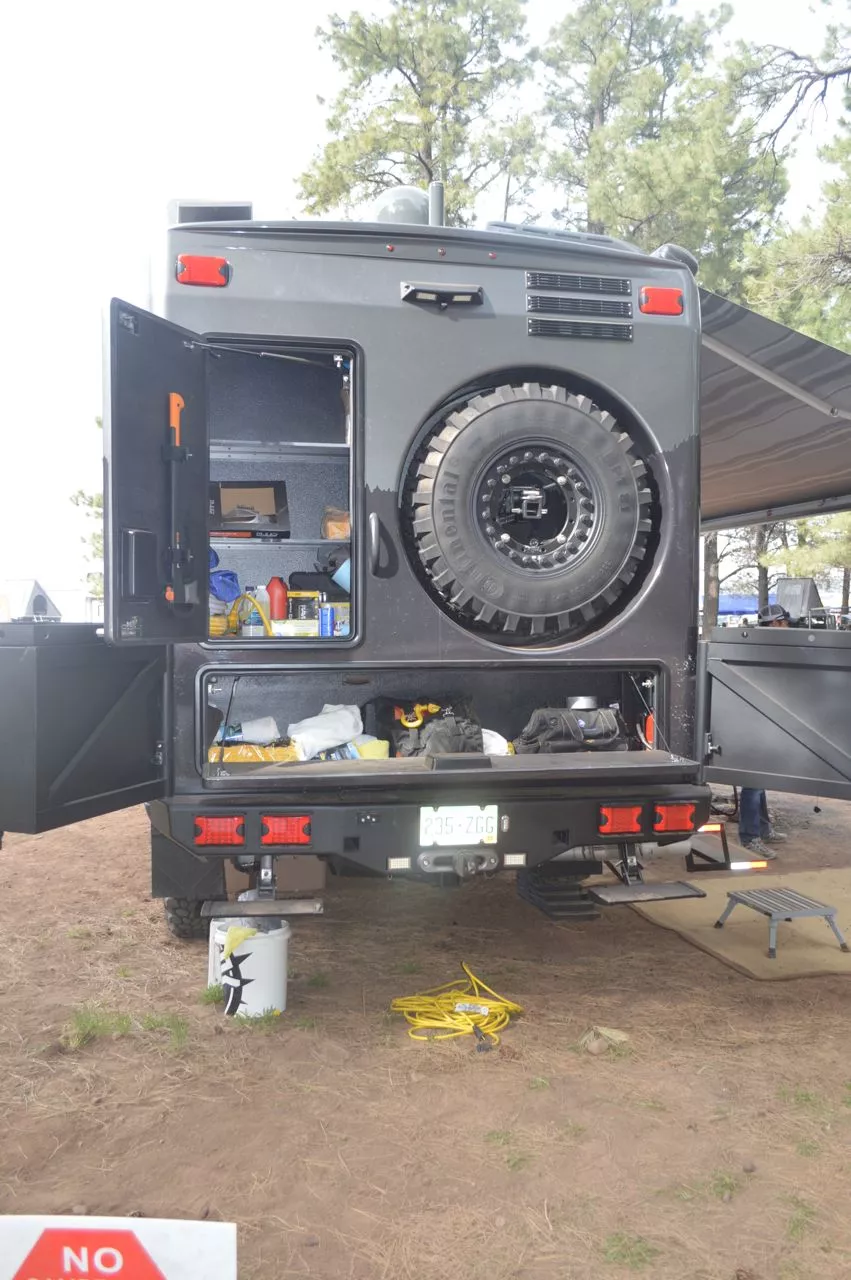 EarthRoamer says the 2014 frame was extended and rear bumper redesigned around the storage boxes and rear winch access