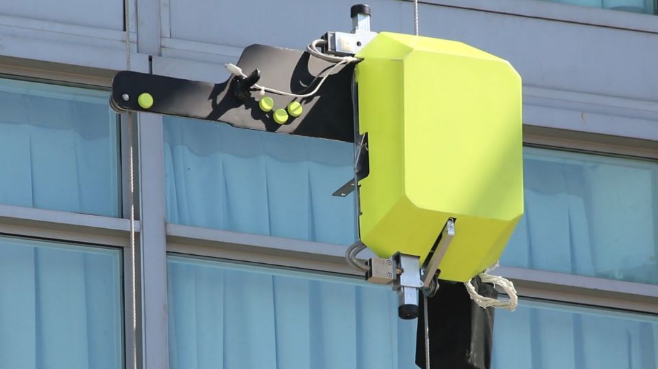 SAM is a robot that climbs along the side of highrise buildings, inspecting them for structural damage