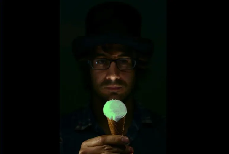 It glows when licked, and presumably doesn't taste like jellyfish