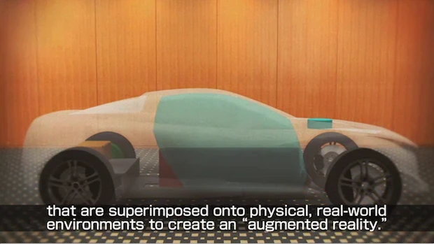 Real world objects can be combined with computer generated images for tactile feedback