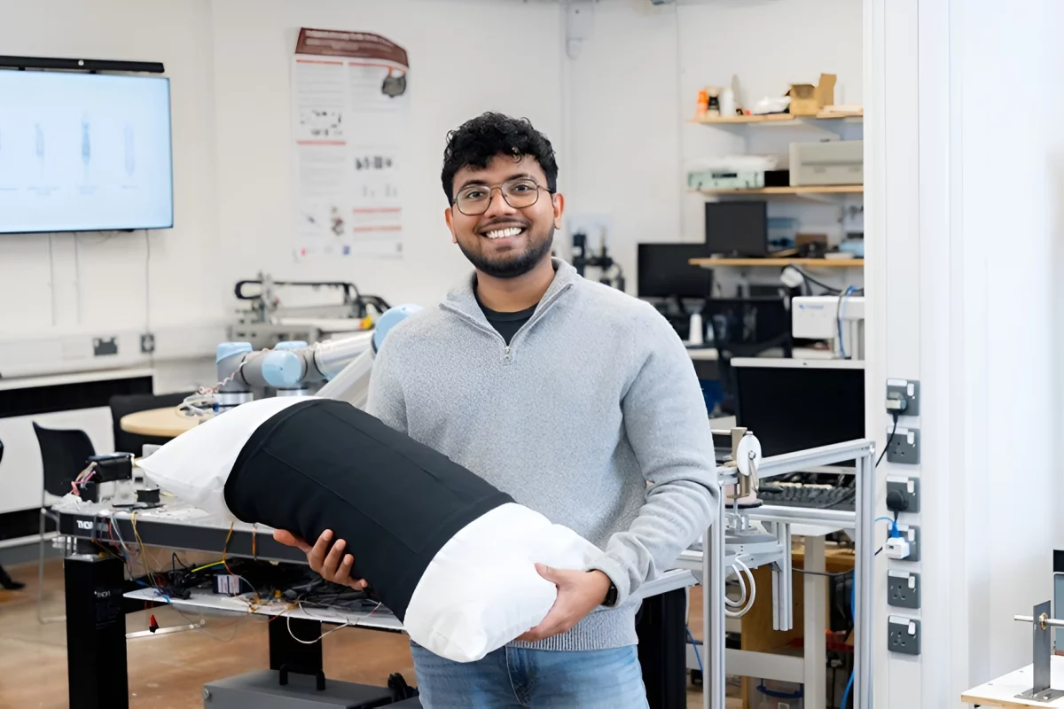 PhD researcher Malindu Ehelagasthenna with the smart pillow sleeve that he invented