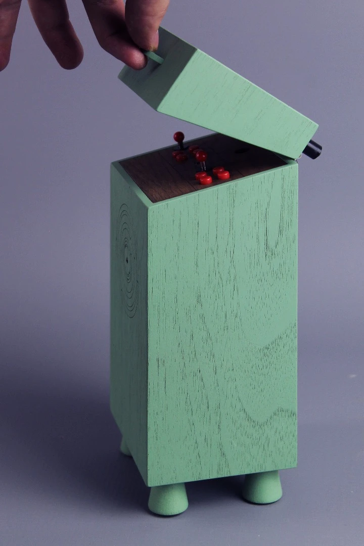This mini replica of a larger arcade cabinet is fully functional