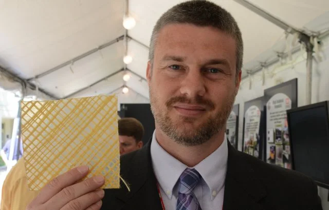 Nick Boone with a sample of the ballistic wallpaper