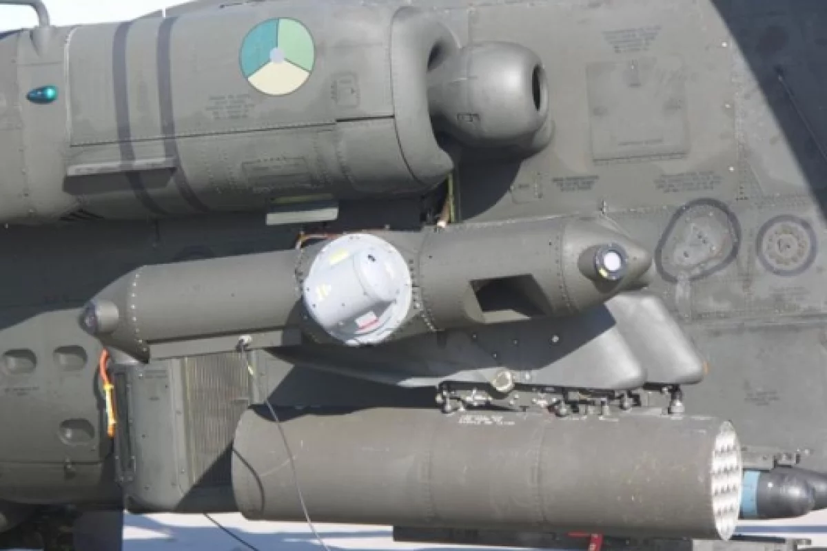 The small pod containing Northrop Grumman's laser Directional Infrared Countermeasures (DIRCM) system mounts to the end of the stub-wing on the Apache AH-64D attack helicopter. The system successfully thwarted a series of simulated heat-seeking missile at