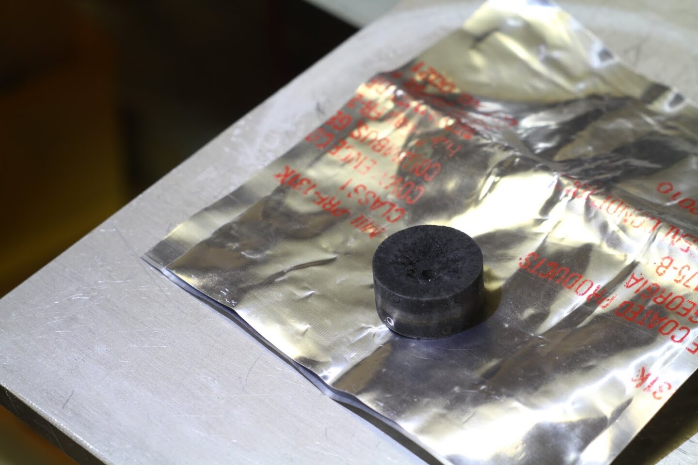 The Neumann drive uses a solid plug of propellant of magnesium, titanium, vanadium, molybdenum, or – shown here – carbon