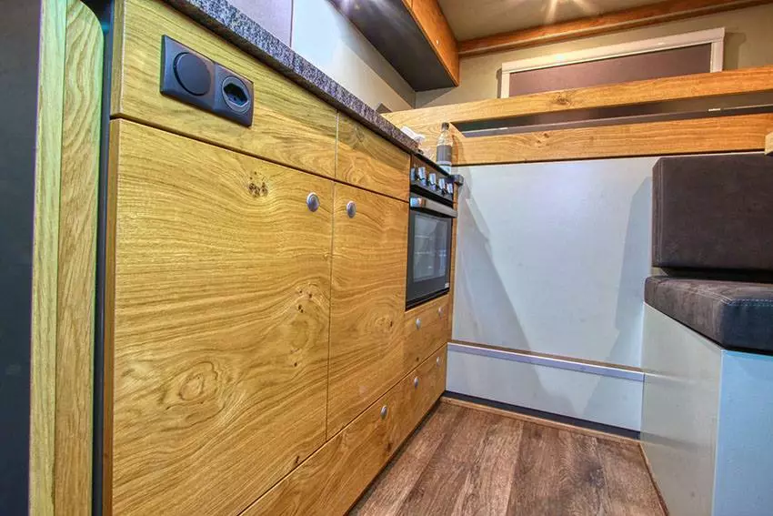 Action Mobil uses wood construction for a clean, rustic look