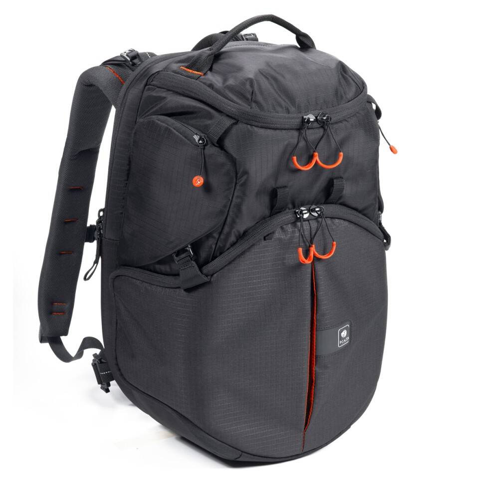 The Kata Revolver-8 backpack stores a DSLR camera and up to five lenses in a rotating internal chamber for quick and easy access