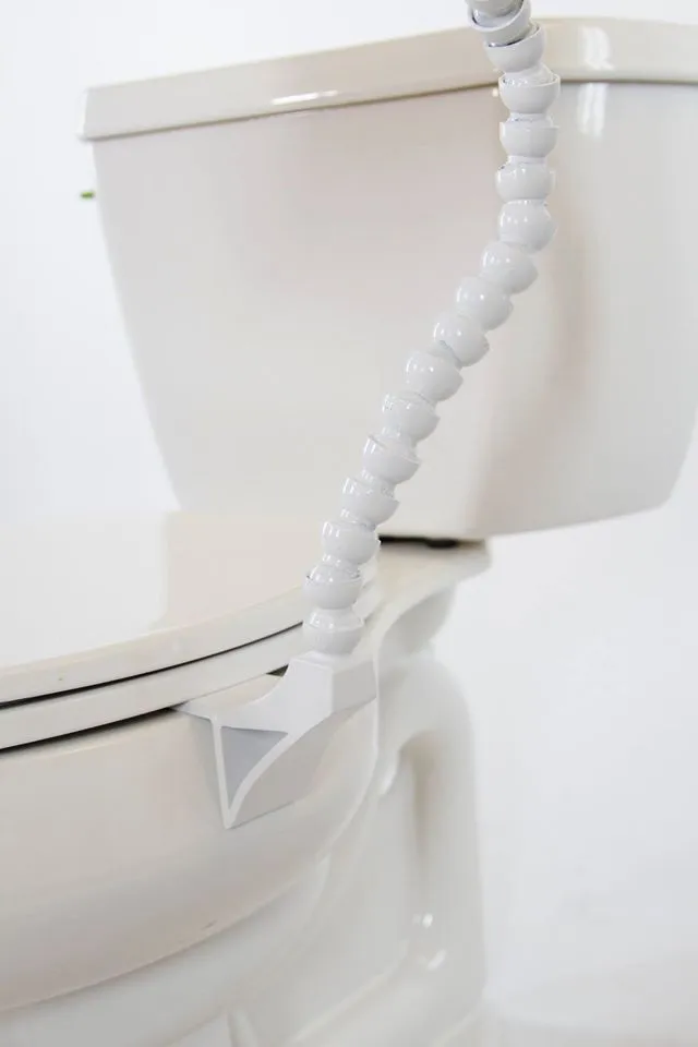The seat can be closed over the clip, so the Main Drain can remain attached when not in use