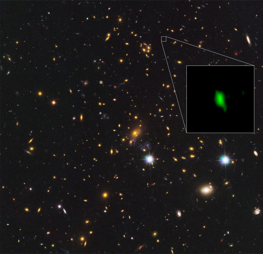 The green section in the inset image represents the oxygen signature detected by ALMA, coming from the galaxy MACS1149-JD1 some 13.28 billion light-years from Earth