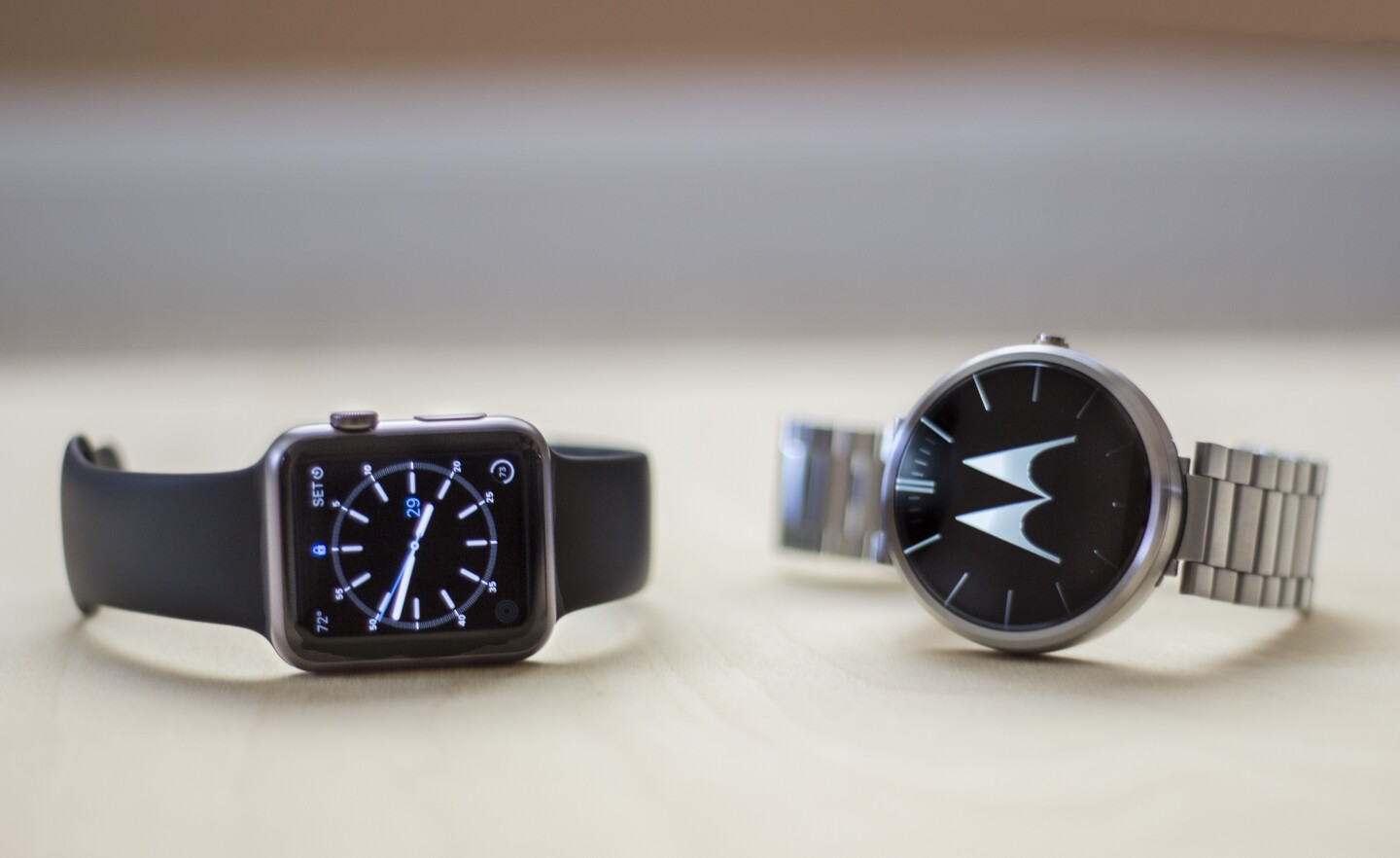 Apple Watch (left) with the Moto 360, one of its chief Android Wear rivals (Photo: Will Shanklin/Gizmag.com)