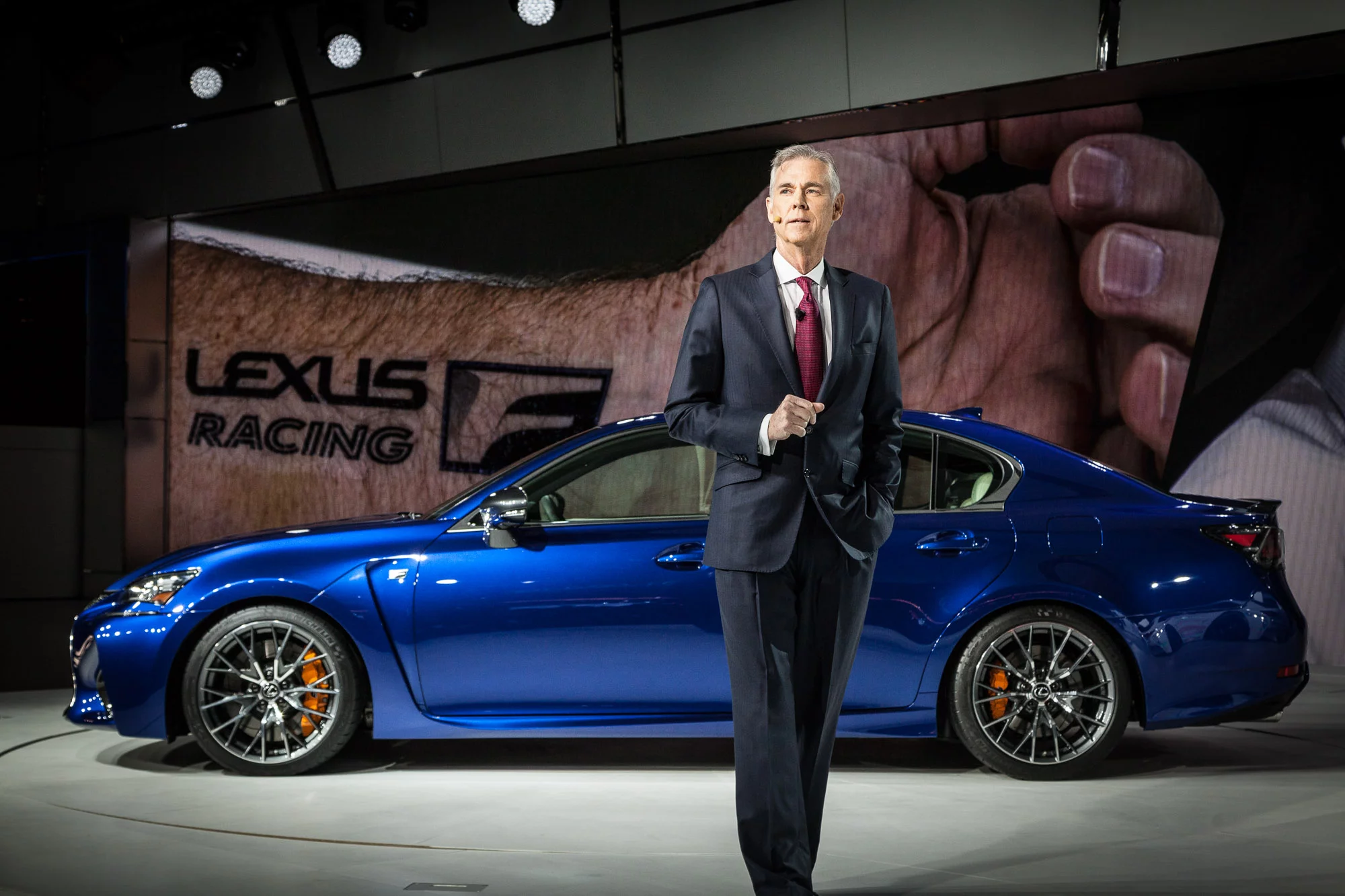 Lexus' CEO revealed to the crowd that he's had the new Lexus Racing F logo tattooed on his forearm (Photo: Gizmag/Loz Blain)