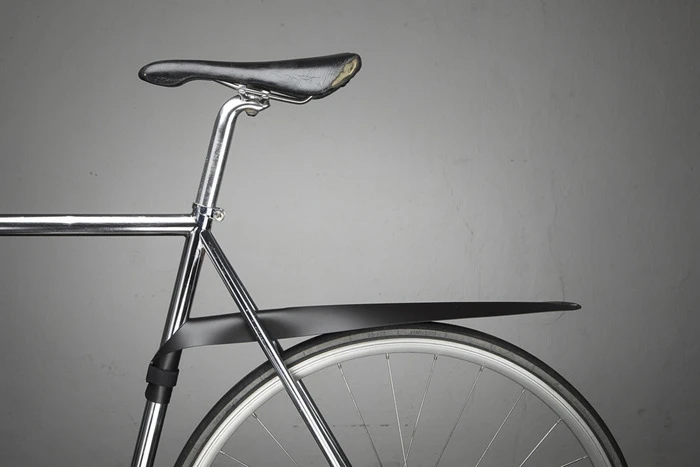The Musguard is a bicycle mudguard that detaches from the bike and rolls up when not in use