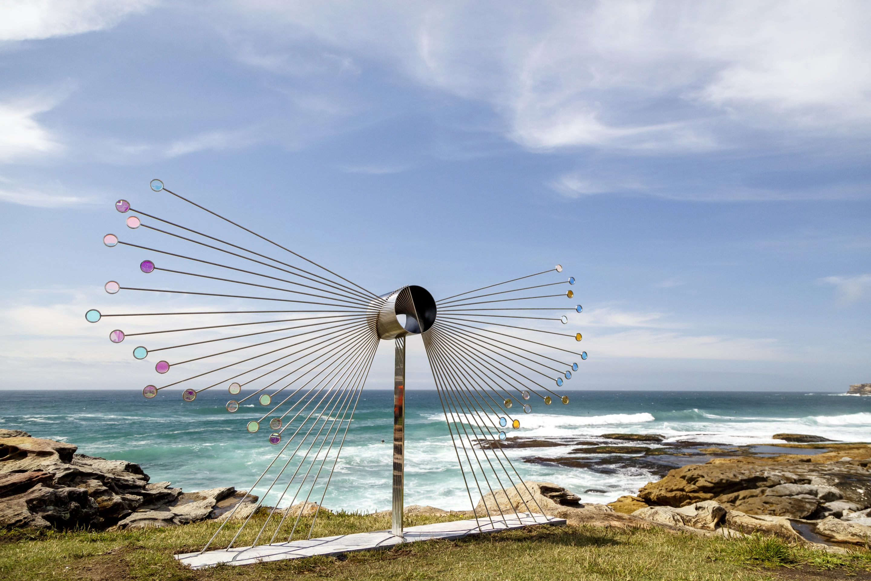 Sculpture by the Sea: Flight, by Rhiannon West, designed to capture daylight and create an array of colors through attached glass lenses