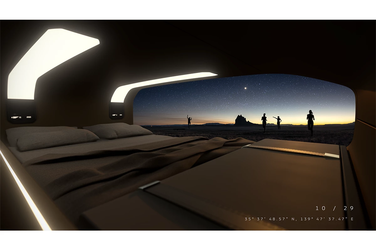 The interior of the Elevance tagalong camper features a teardrop-like layout with a mattress that fills out the area and some storage toward the foot of the bed – no pictures of a rear galley, though