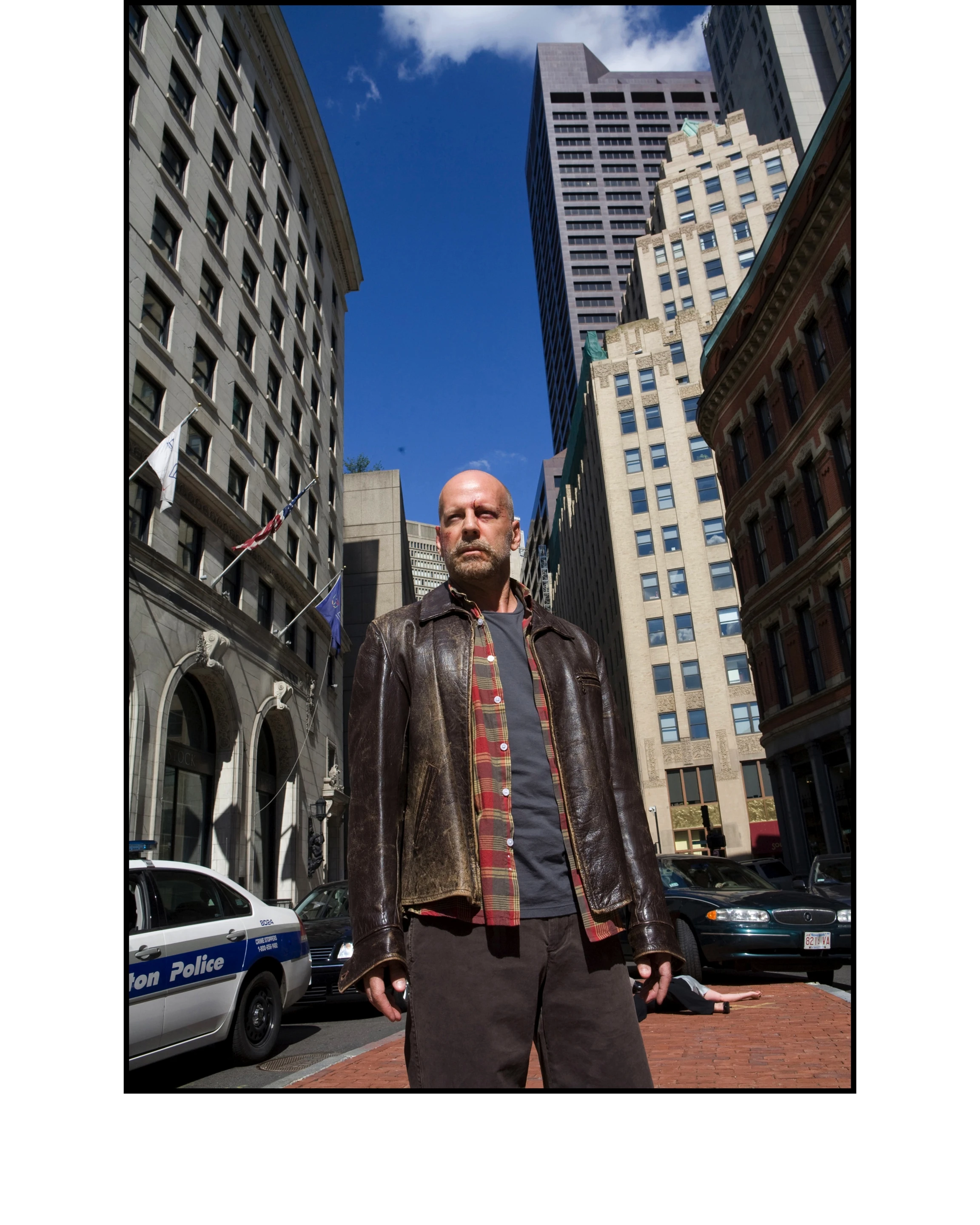 Bruce Willis in the movie "Surrogates" - a lone figure on the streets when the robots "melt down"