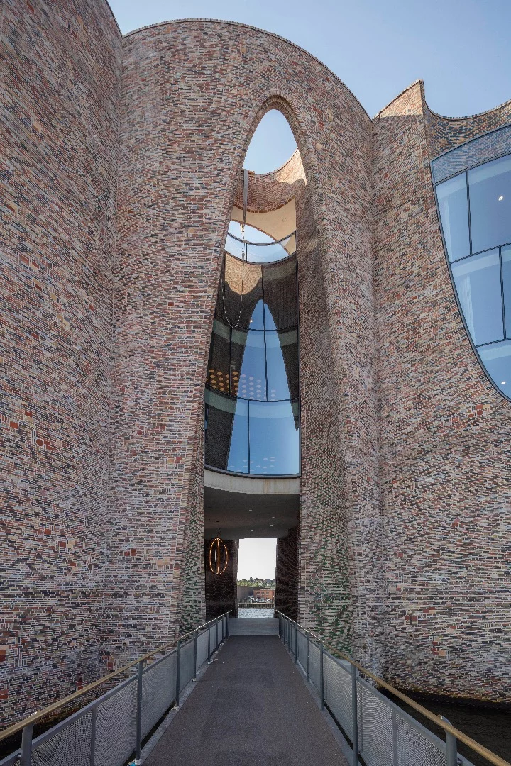 The building is accessed from land by a short footbridge