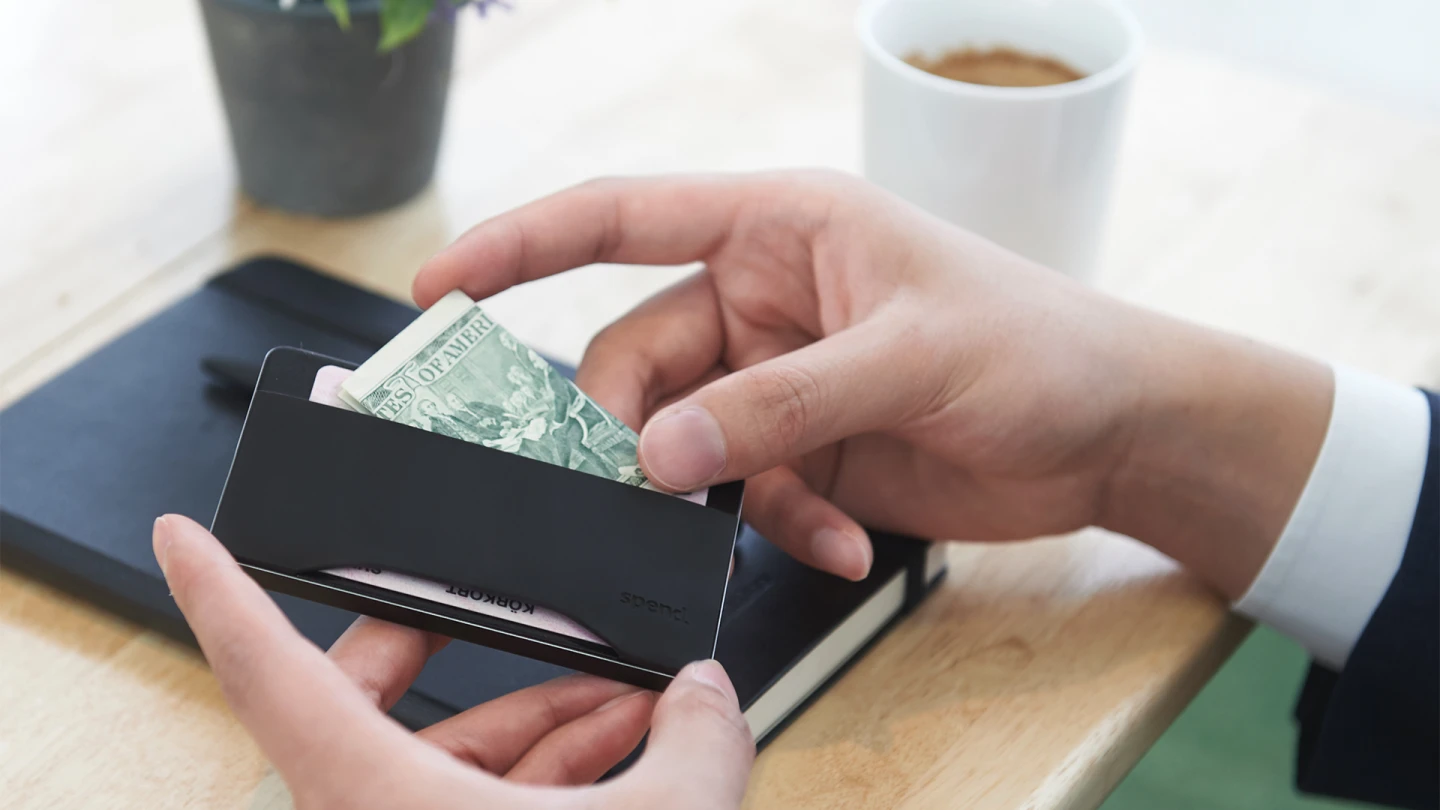 A little pouch on the rear of the Spendwallet lets users carry other essentials like ID and a few bank notes