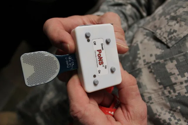 A prototype tongue-buzzing PoNS device