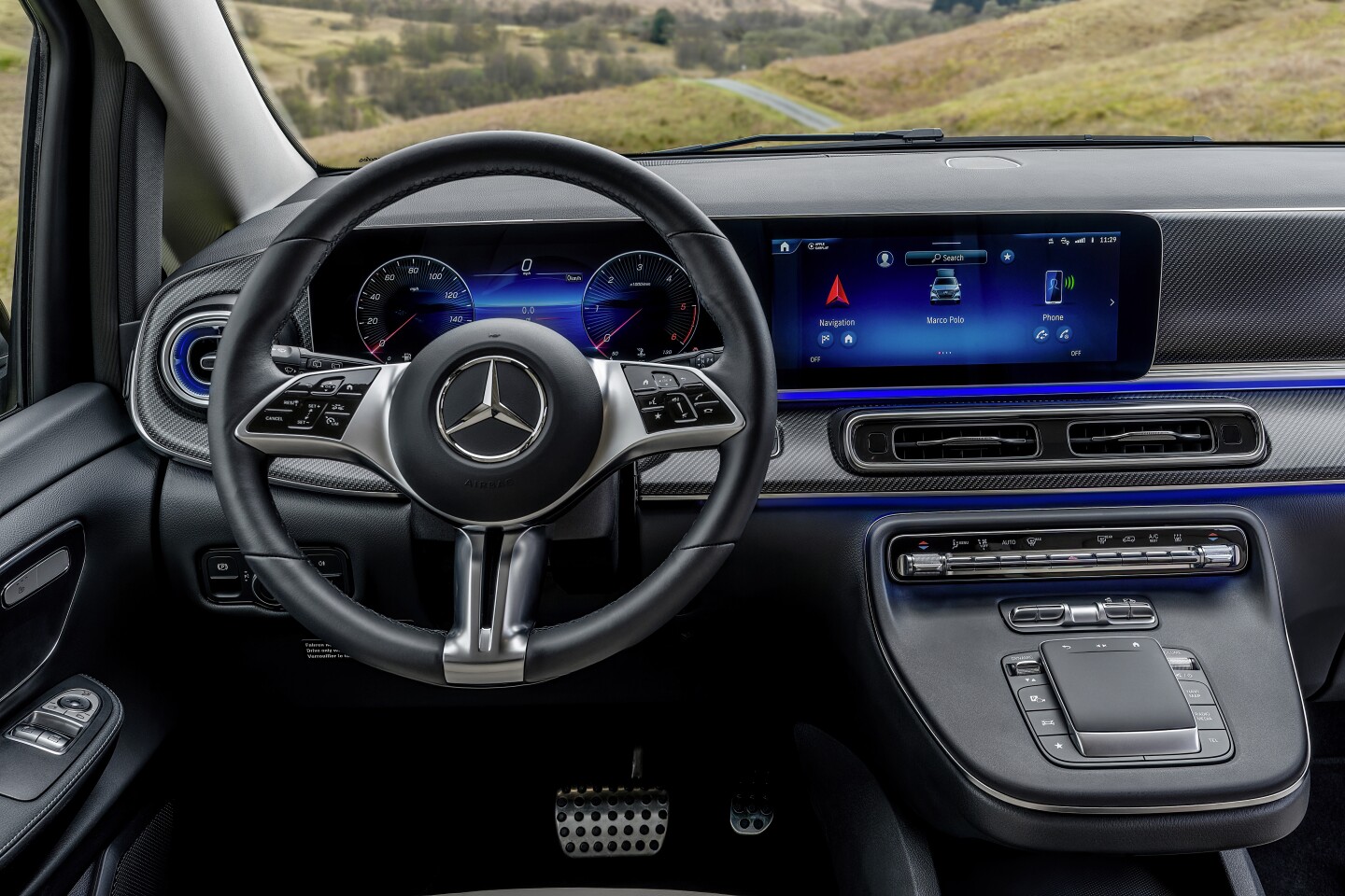 Driver's cockpit with dual widescreen display and touchpad controller